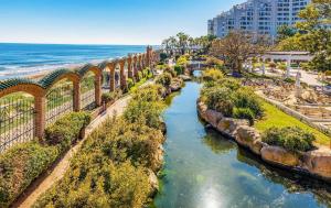 an aerial view of a river near the beach at Torremar Living in Oropesa del Mar