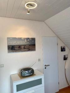 バルトルムにあるHiev upのカウンターの上に電話が置いてある部屋
