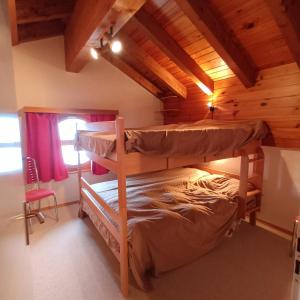 En eller flere senger på et rom på Magnifique duplex - Vue imprenable