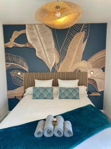 En eller flere senge i et værelse på Suite "Spa" - Domaine des Varennes