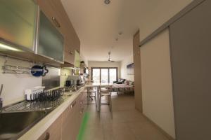 Kuchyň nebo kuchyňský kout v ubytování Olivier Residence