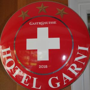 Ein Zertifikat, Auszeichnung, Logo oder anderes Dokument, das in der Unterkunft Garni Hotel Torkelbündte ausgestellt ist