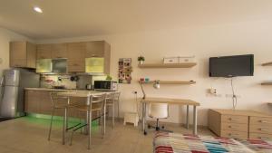 Kuchyň nebo kuchyňský kout v ubytování Olivier Residence
