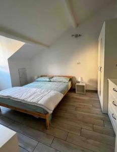 Postel nebo postele na pokoji v ubytování Street Montegani