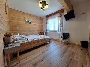 Postel nebo postele na pokoji v ubytování Pokoje Gościnne Wierzbówka przy Termach