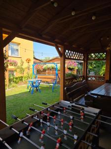 a ping pong table in a room with a ping pong ball at u eli i jurka in Sztutowo
