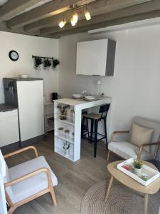 Køkken eller tekøkken på La P'tite Maison D'Auron