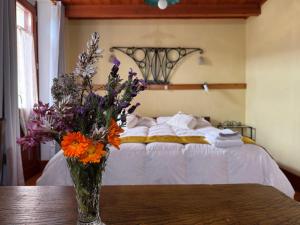 Postel nebo postele na pokoji v ubytování B&B Muggianeddu