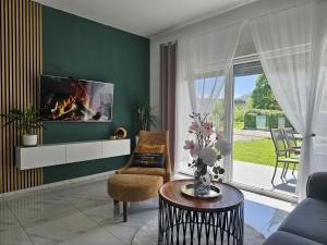 Χώρος καθιστικού στο Una Luxury Home
