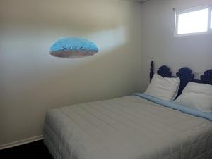 Postel nebo postele na pokoji v ubytování Ocean Avenue Inn