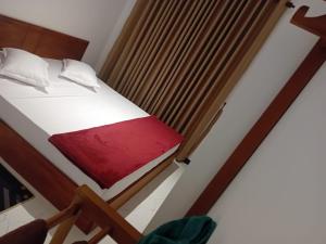 En eller flere senge i et værelse på URBAN Lodge + 12 billeder