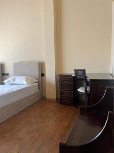 Postel nebo postele na pokoji v ubytování B Boutique Hotel