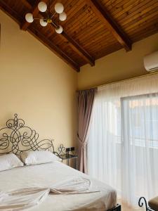 Postel nebo postele na pokoji v ubytování B Boutique Hotel