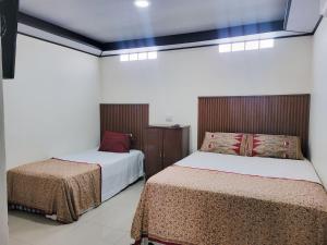 Postel nebo postele na pokoji v ubytování Casa Miraflores