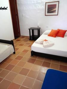 Giường trong phòng chung tại Hospedaje Don Juan