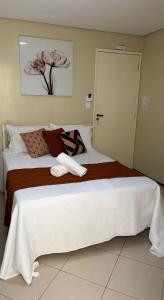 Cama ou camas em um quarto em Sr Hotel