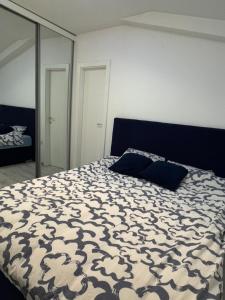 Ліжко або ліжка в номері Jak apartman