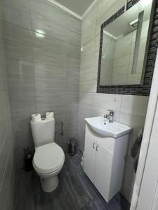Ванна кімната в Jak apartman
