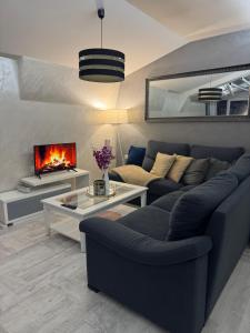 Зона вітальні в Jak apartman