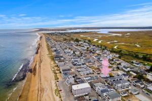 an aerial view of a beach with houses and the ocean at The Cammie Cabana Pet Friendly Steps to Beach in Salisbury