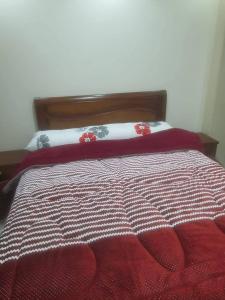 Postel nebo postele na pokoji v ubytování عبق التاريخ هاوس + 5 fotografií