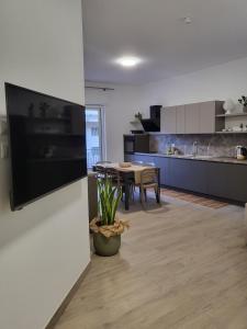 Kuchyň nebo kuchyňský kout v ubytování Le Gurne Apartment valle dell 'Alcantara
