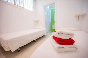 Postel nebo postele na pokoji v ubytování Seagulls melody C-208