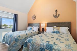 Ocean's Bliss at Arcadian Dunes客房内的一张或多张床位