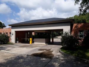 un bâtiment avec un parking et un garage dans l'établissement Terrazas de San Lorenzo - Salta, à San Lorenzo 5 autres photos