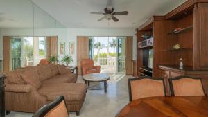 a living room with a couch and a table at 408 Mariners Club in Key Largo