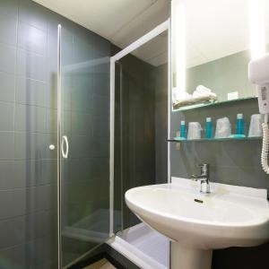 Phòng tắm tại Hôtel Atrium Mondial