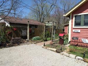 a house with a sign on the side of it at Betty Lous Garden in Nashville