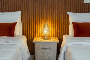 Postel nebo postele na pokoji v ubytování Hola Luxury Appart
