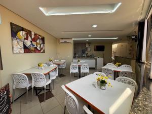 Uma área de estar em Sr Hotel