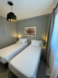 Pamparelax25客房内的一张或多张床位