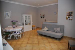 A seating area at All Suite Colosseo