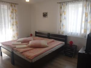 Säng eller sängar i ett rum på Ośrodek Wypoczynkowy Nad Stawem