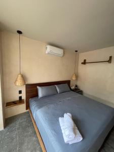 Hotel Renata客房内的一张或多张床位
