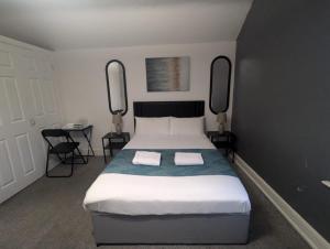 Ένα ή περισσότερα κρεβάτια σε δωμάτιο στο Contractor Rooms South Shields