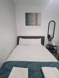 Ένα ή περισσότερα κρεβάτια σε δωμάτιο στο Contractor Rooms South Shields