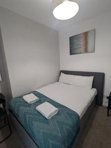 Ένα ή περισσότερα κρεβάτια σε δωμάτιο στο Contractor Rooms South Shields