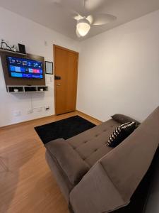 TV a/nebo společenská místnost v ubytování Ap Refúgio tranquilo n 10 próx Recinto Expo