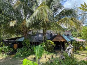 Vonkajšia záhrada v ubytovaní The Nipah Chalet