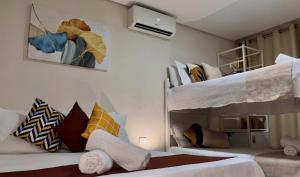Cama ou camas em um quarto em Sr Hotel