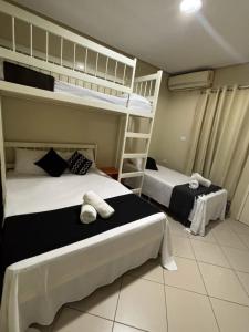 Cama ou camas em um quarto em Sr Hotel