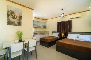 Kuchyň nebo kuchyňský kout v ubytování Mifaña Suites - Panglao Island