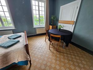 Postel nebo postele na pokoji v ubytování Chambre d'hôte à la campagne