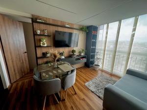 TV a/nebo společenská místnost v ubytování Increíble Apartamento Para Tu Estadía En Tunja