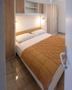 Postel nebo postele na pokoji v ubytování Sunny Apartment Octopus