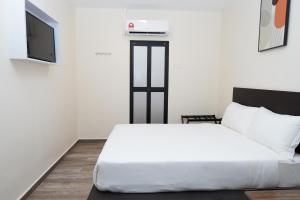 Postel nebo postele na pokoji v ubytování Anta Hotel